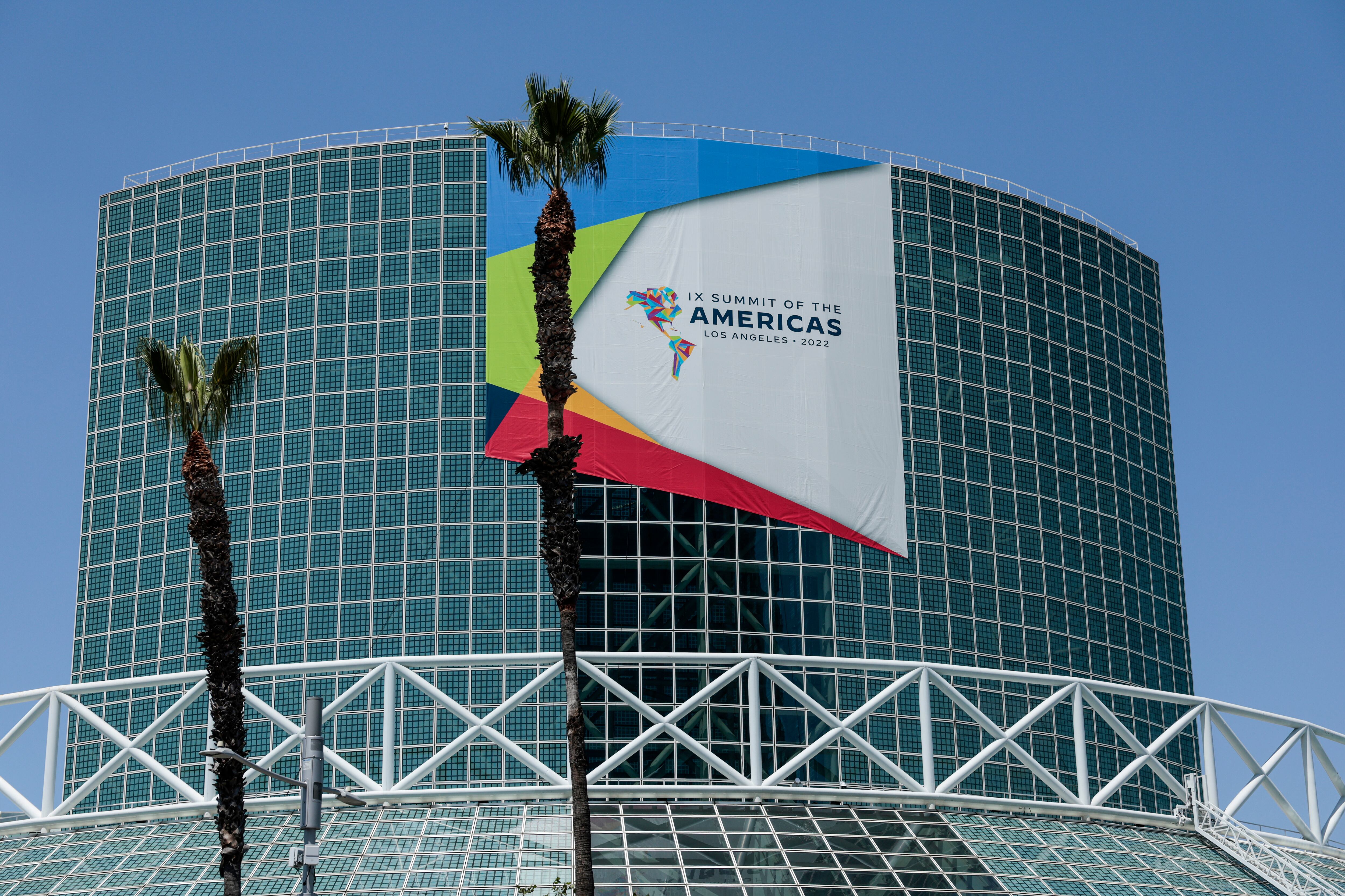 LOS ANGELES, CALIFORNIA - JUNE 06: A banner for the Ninth Summit of the Americas hangs on the Los Angeles Convention Center on June 06, 2022 in Los Angeles, California. Leaders from North, Central and South America will travel to Los Angeles for the summit to discuss issues such as trade and migration. The United States is hosting the summit for the first time since 1994, when it took place in Miami. (Photo by Anna Moneymaker/Getty Images)
