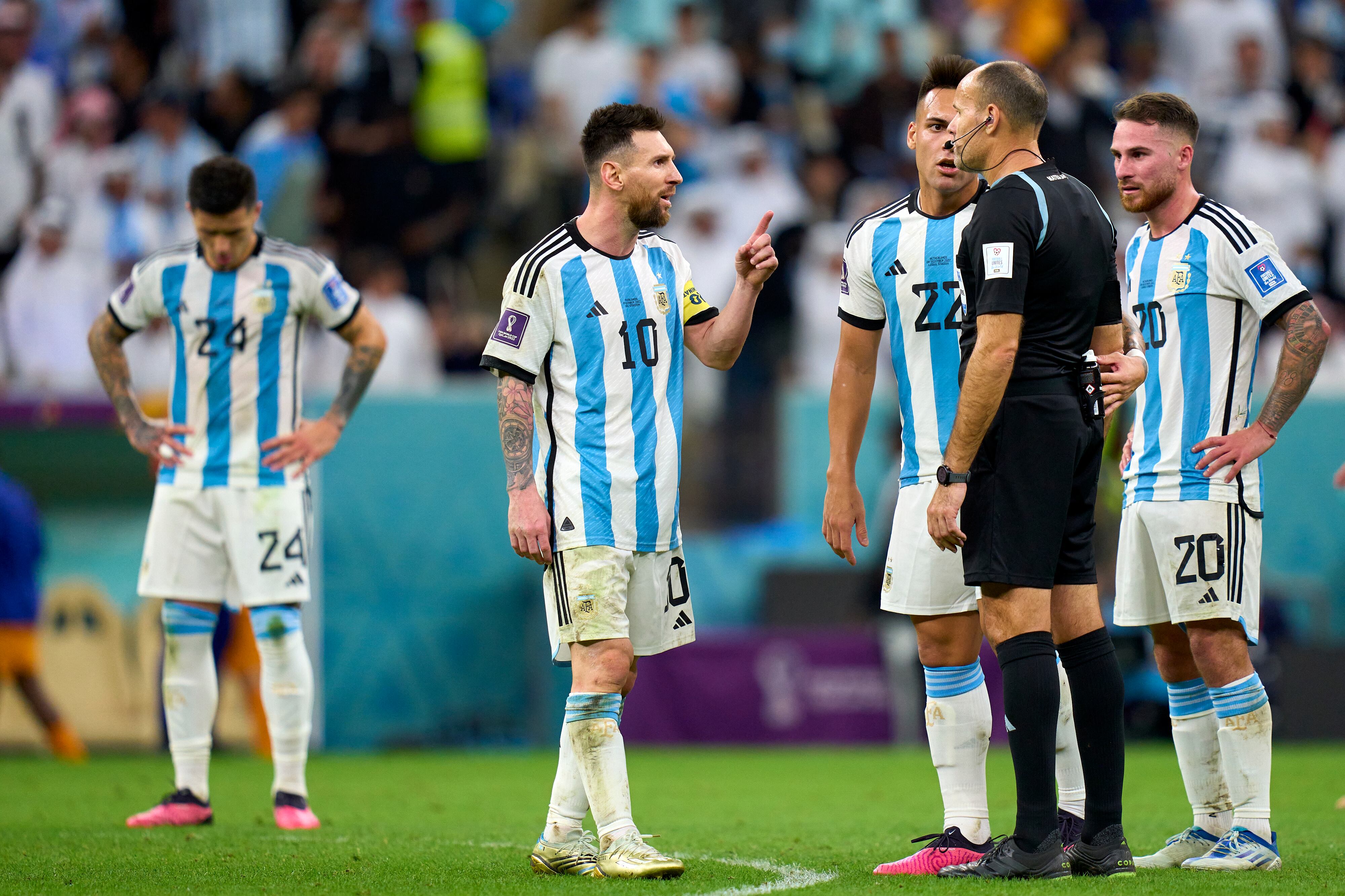 LUSAIL CITY, QATAR - DECEMBER 09: Lionel Messi of Argentina argues with the Referee Antonio Mateu Lahoz of Spain during the FIFA World Cup Qatar 2022 quarter final match between Netherlands and Argentina at Lusail Stadium on December 09, 2022 in Lusail City, Qatar. (Photo by Juan Luis Diaz/Quality Sport Images/Getty Images)