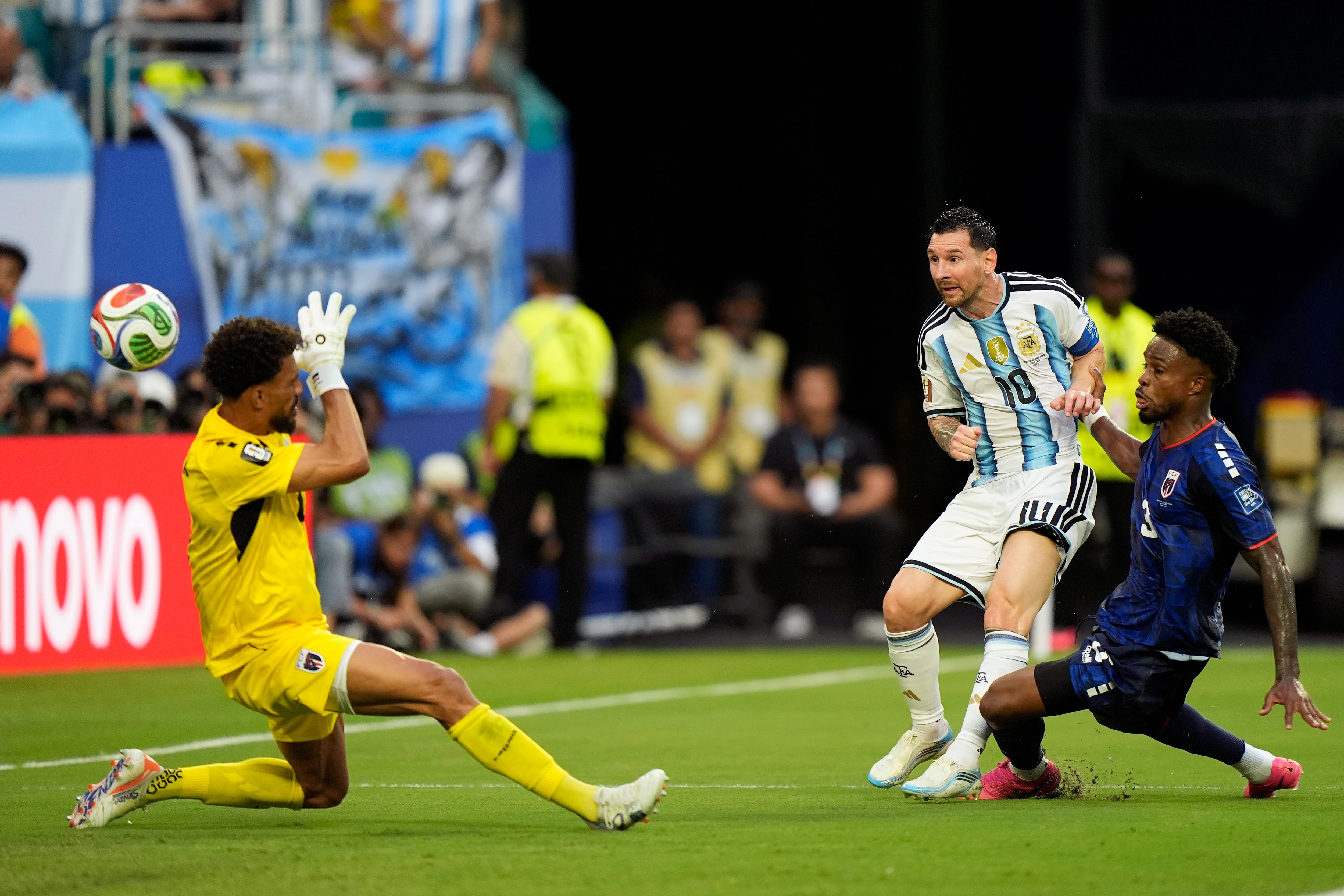 MIAMI GARDENS, UNITED STATES - JULY 3: Lionel Messi of Argentina scores the team's first goal, Vozinha of Cape Verde, Diney of Cape Verde during the Round Of 32 - FIFA World Cup 2026 match between Argentina and Cabo Verde at Miami Stadium on July 3, 2026 in Miami Gardens, Florida. (Photo by Pablo Morano/BSR Agency/Getty Images)
