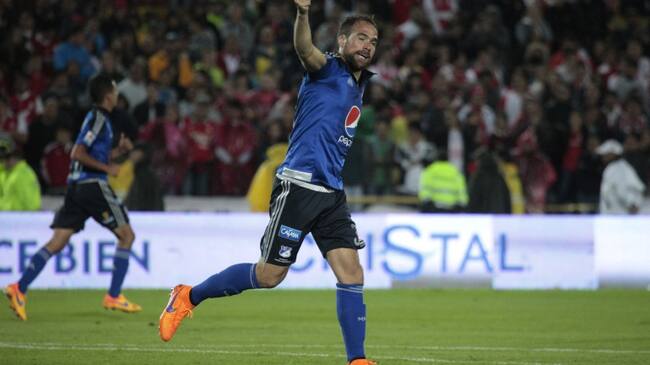 Federico Insúa celebra uno de sus dos goles marcado a Santa Fe en 2015.