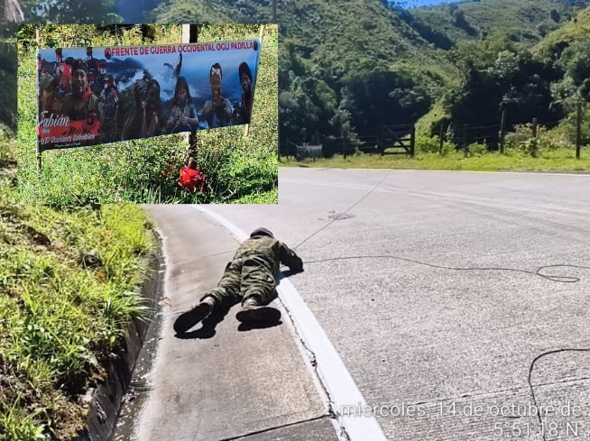 Pancarta del ELN instalada con un explosivo en la vía Medellín- Quibdó- fotos Séptima División del Ejército.
