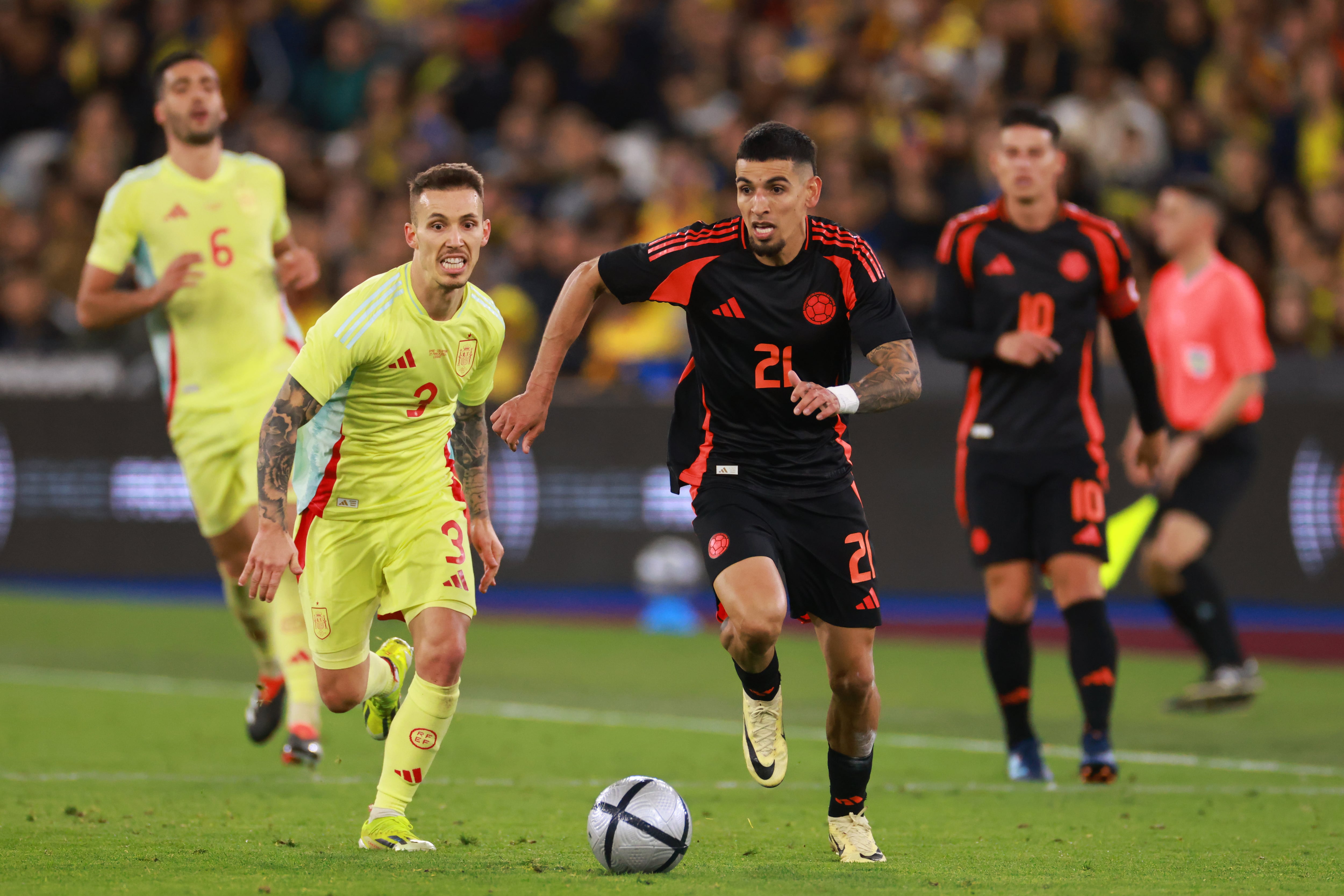 LONDON, ENGLAND - MARCH 22: Daniel Munoz of Colombia in action with Alex Grimaldo of Spainduring the international friendly match between Spain and Colombia at London Stadium on March 22, 2024 in London, England. (Photo by Marc Atkins/Getty Images)