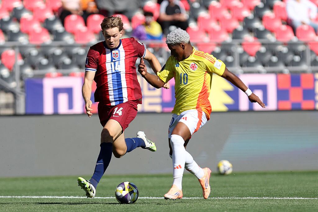 Oscar Perea jugador colombiano y Jonathan Norbye jugador noruego / Getty Images