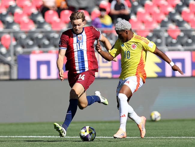 Oscar Perea jugador colombiano y Jonathan Norbye jugador noruego / Getty Images