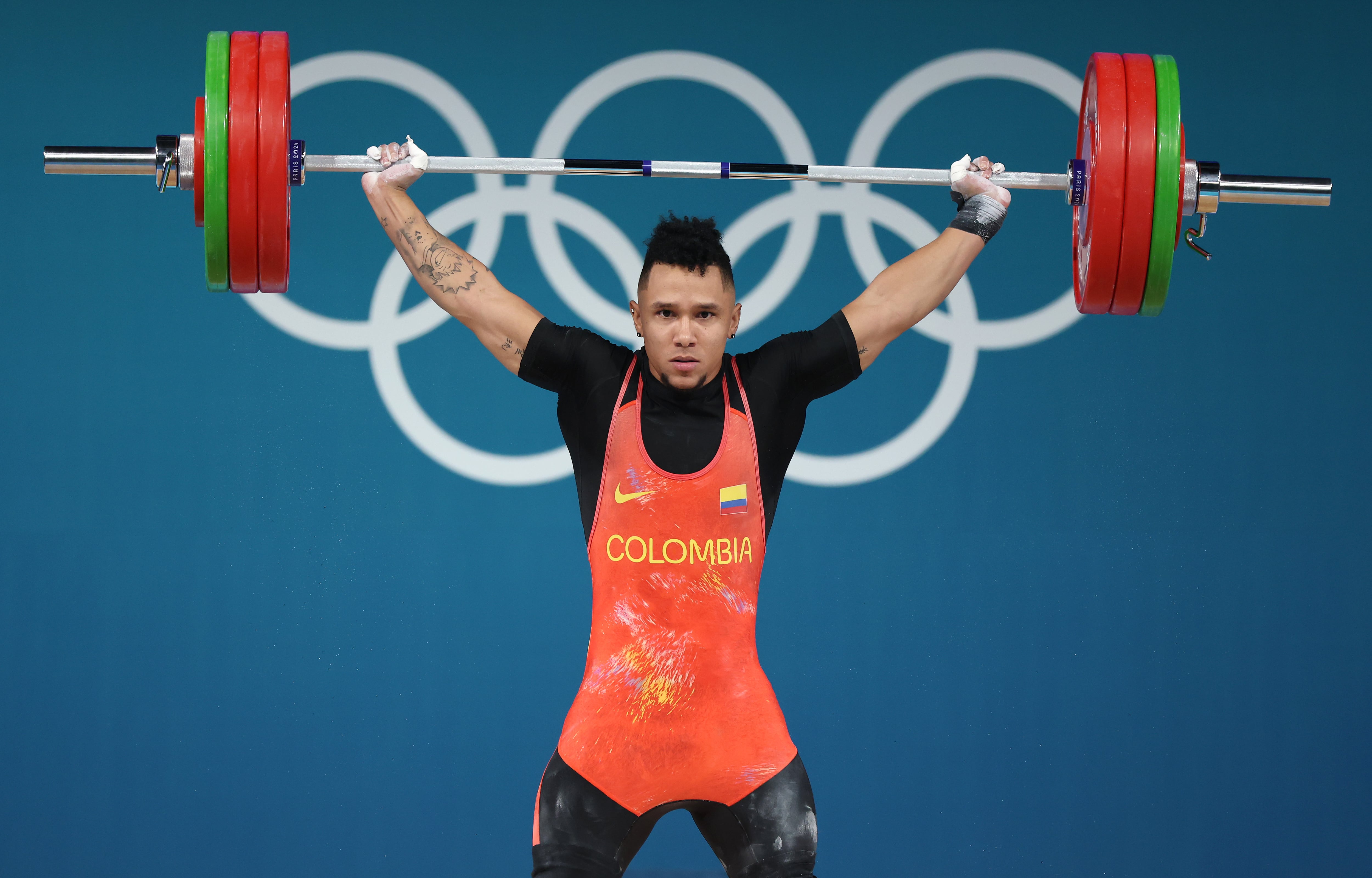 Luis Javier Mosquera durante su participación en el levantamiento de pesas. (Photo by Matthew Stockman/Getty Images)