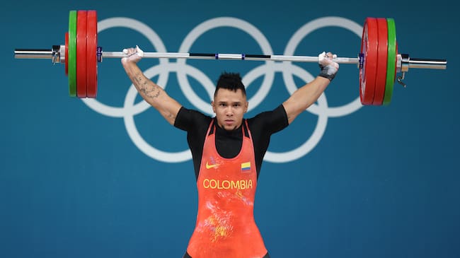 Luis Javier Mosquera durante su participación en el levantamiento de pesas. (Photo by Matthew Stockman/Getty Images)