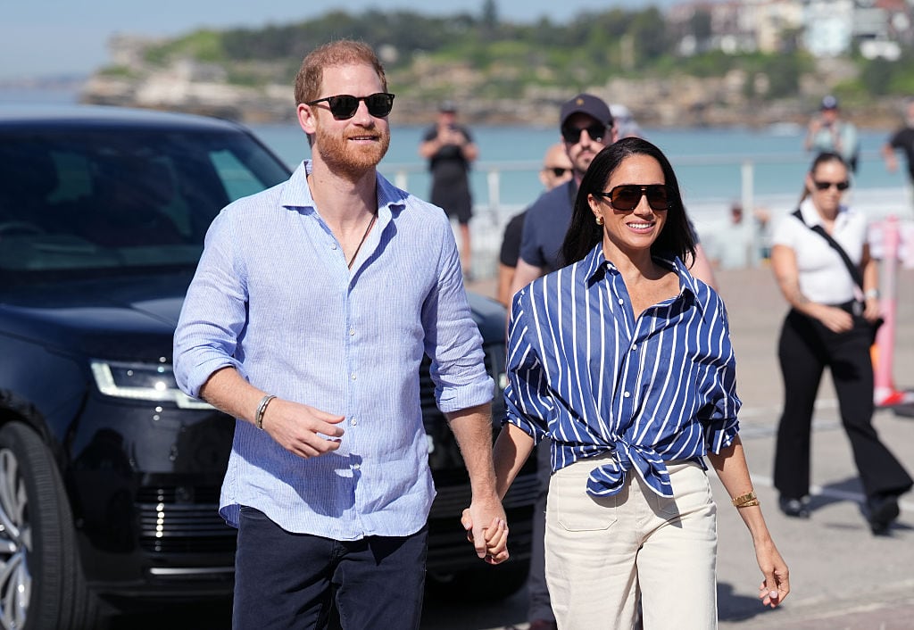 SYDNEY, AUSTRALIA - APRIL 17: Prince Harry, Duke of Sussex and Meghan, Duchess of Sussex arrive to meet volunteer first responders from Bondi Surf Bathers' Life Saving Club, during a visit to Bondi Beach, on day four of the royal trip to Australia on April 17, 2026 in Sydney, Australia. Volunteers from the organisation, founded in 1907, played an integral role in protecting beachgoers and saving lives during the terrorist attack at Bondi Beach on December 14. (Photo by Jonathan Brady-Pool/Getty Images)