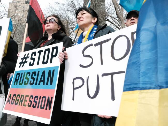 NEW YORK, NEW YORK - FEBRUARY 17: Dozens of pro-Ukrainian activists and Ukrainian Americans rally outside of the United Nations (UN) as world leaders gather there to discuss the increasing tension with Russia over its military build-up on Ukraine's border on February 17, 2022 in New York City. The U.S. Secretary of State, Antony Blinken, made an unscheduled appearance at a U.N. Security Council meeting to discuss the situation in Ukraine on Thursday. (Photo by Spencer Platt/Getty Images)