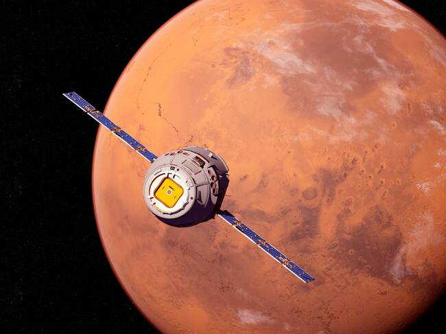 Ilustración de un satélite frente a Marte. Foto Getty Images