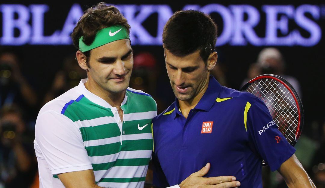 Roger Federer junto a Novak Djokovic.