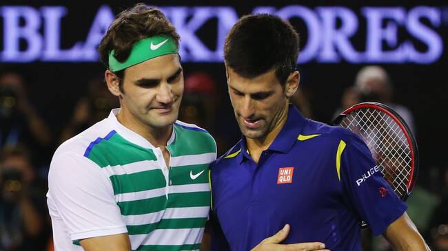 Roger Federer junto a Novak Djokovic.