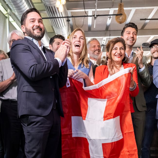 Bern (Switzerland), 27/09/2026.- (L-R) SP Co-President and National Council member Cedric Wermuth (SP-AG), National Council members Corina Gredig (GLP-ZH), and Sibel Arslan (GP-BS), and National Council member Fabian Molina (SP-ZH) react to the first clear projections at the vote-counting center of the nonpartisan 'No' committee against the referendum on 'Safeguard Swiss neutrality (Neutrality Initiative)', in Bern, Switzerland, 27 September 2026. (Suiza) EFE/EPA/ALESSANDRO DELLA VALLE