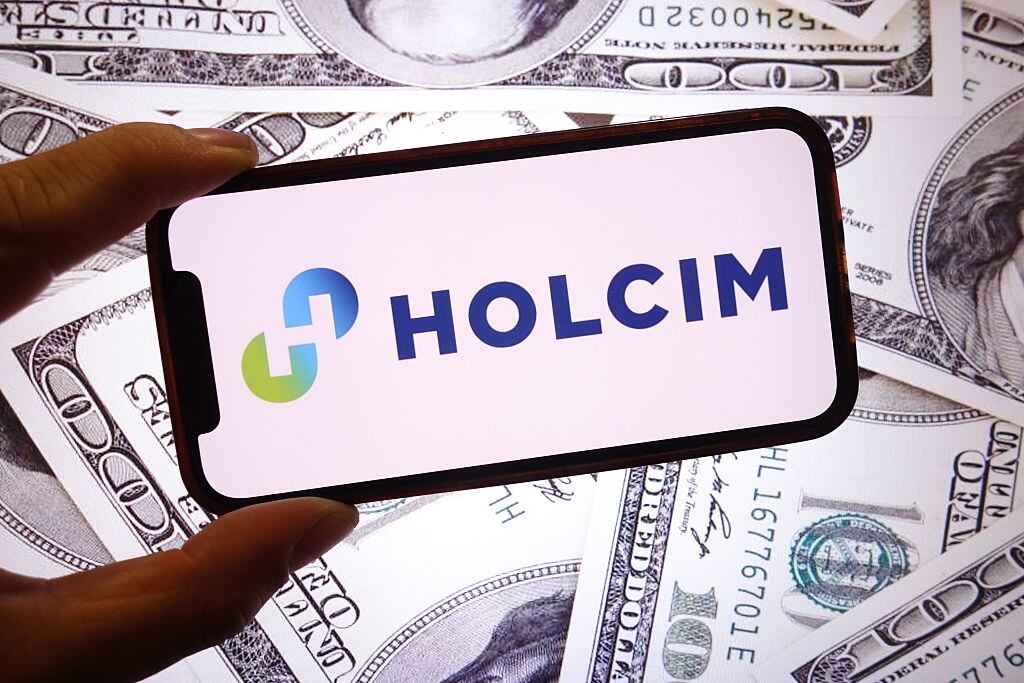 Holcim Group. Foto: Illustration by Piotr Swat/SOPA Images/LightRocket via Getty Images)