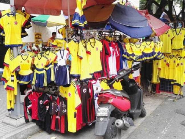 Comercio optimista de un aumento de las ventas por el partido de Colombia-Argentina.