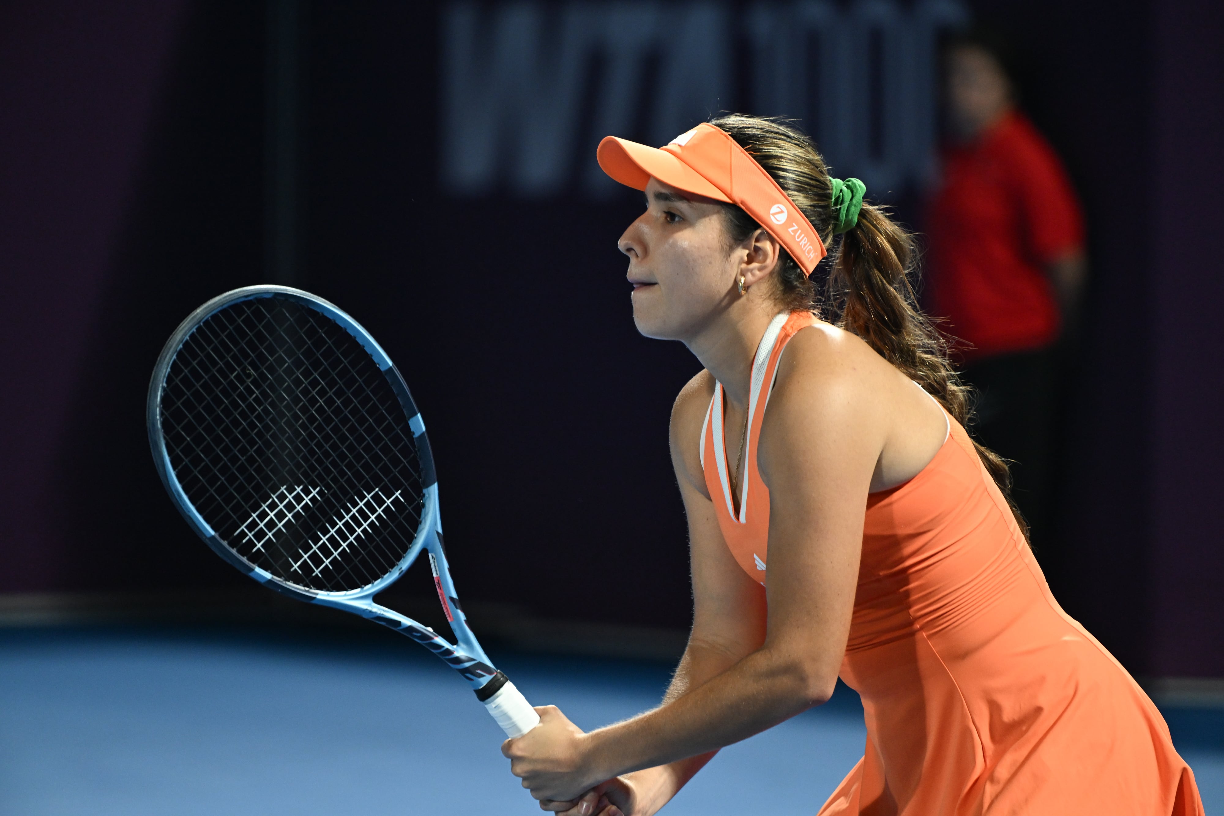 DOHA, QATAR  FEBRUARY 9: Camila Osorio of Colombia competes against Emma Raducanu of the Great Britain in the first round on Day Two of the Qatar TotalEnergies Open, part of the Hologic WTA Tour, at the Khalifa International Tennis and Squash Complex on February 9, 2026 in Doha, Qatar. (Photo by Artur Widak/NurPhoto via Getty Images)