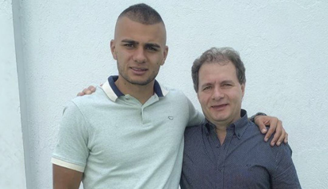 Jhon Duque junto a su padre