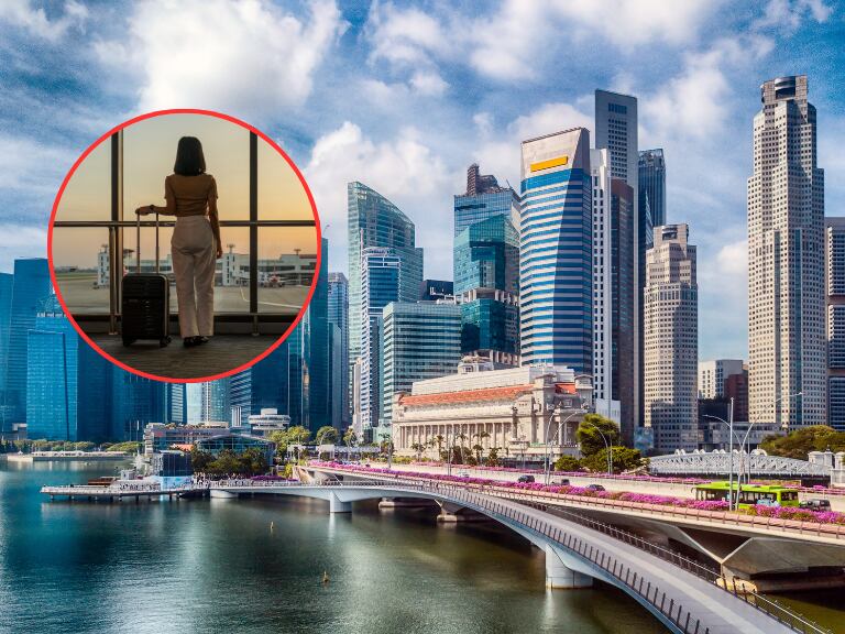 Persona con una maleta de viaje y de fondo un paisaje en Singapur (Fotos vía Getty Images)