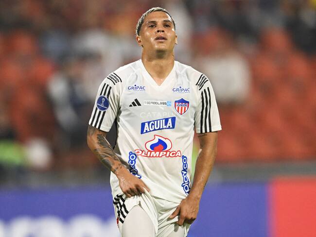Junior's midfielder Juan Quintero reacts after shooting during the Copa Sudamericana first stage football match between Colombia's Deportes Tolima and Colombia's Junior, at the Manuel Murillo Toro stadium, in Ibague, Colombia, on March 9, 2023. (Photo by Raul ARBOLEDA / AFP) (Photo by RAUL ARBOLEDA/AFP via Getty Images)