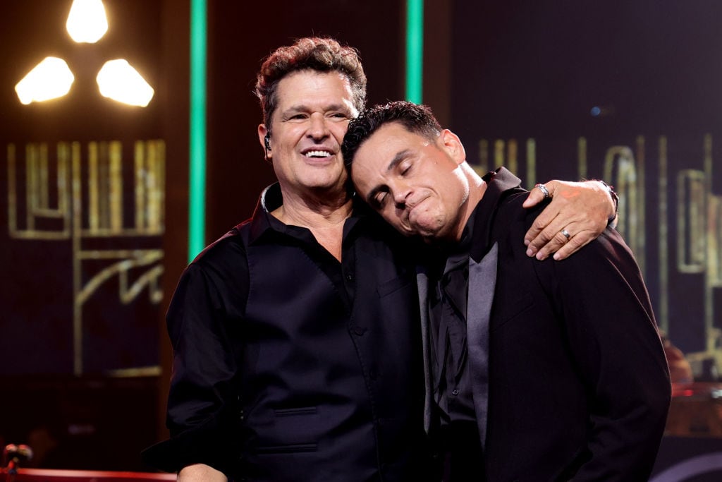 MIAMI, FLORIDA - NOVEMBER 13: (L-R) Honoree Carlos Vives and Silvestre Dangond perform onstage during the 2024 Latin Recording Academy Person of The Year Honoring Carlos Vives at Miami Beach Convention Center on November 13, 2024 in Miami, Florida. (Photo by John Parra/Getty Images for The Latin Recording Academy)