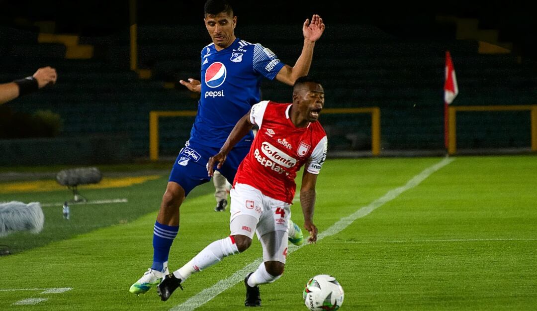 Carlos Arboleda en un clásico ante Millonarios.