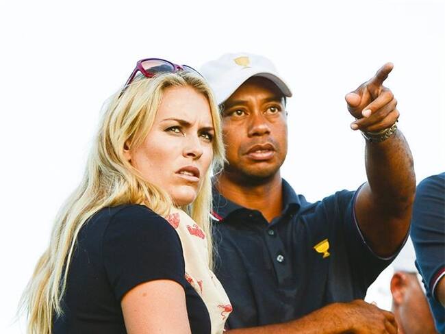 Tiger Woods compite en el Presidents Cup, acompañado de su novia