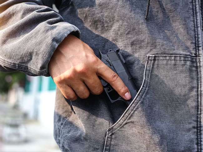 Imagen de referencia de hombre armado. Foto: Getty Images