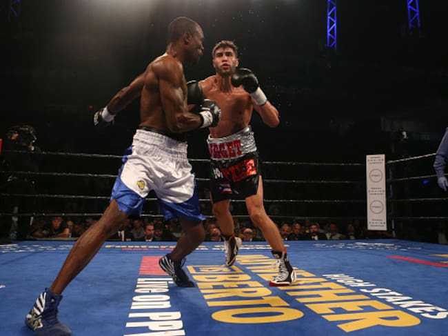 TORONTO, ON - SEPTEMBER 11 - Prichard Digget Colon defeated Vivian Vicious Harris (blue trunks) during the Premier Boxing Champion event at the Ricoh Coliseum on September 11, 2015. (Carlos Osorio/Toronto Star via Getty Images)