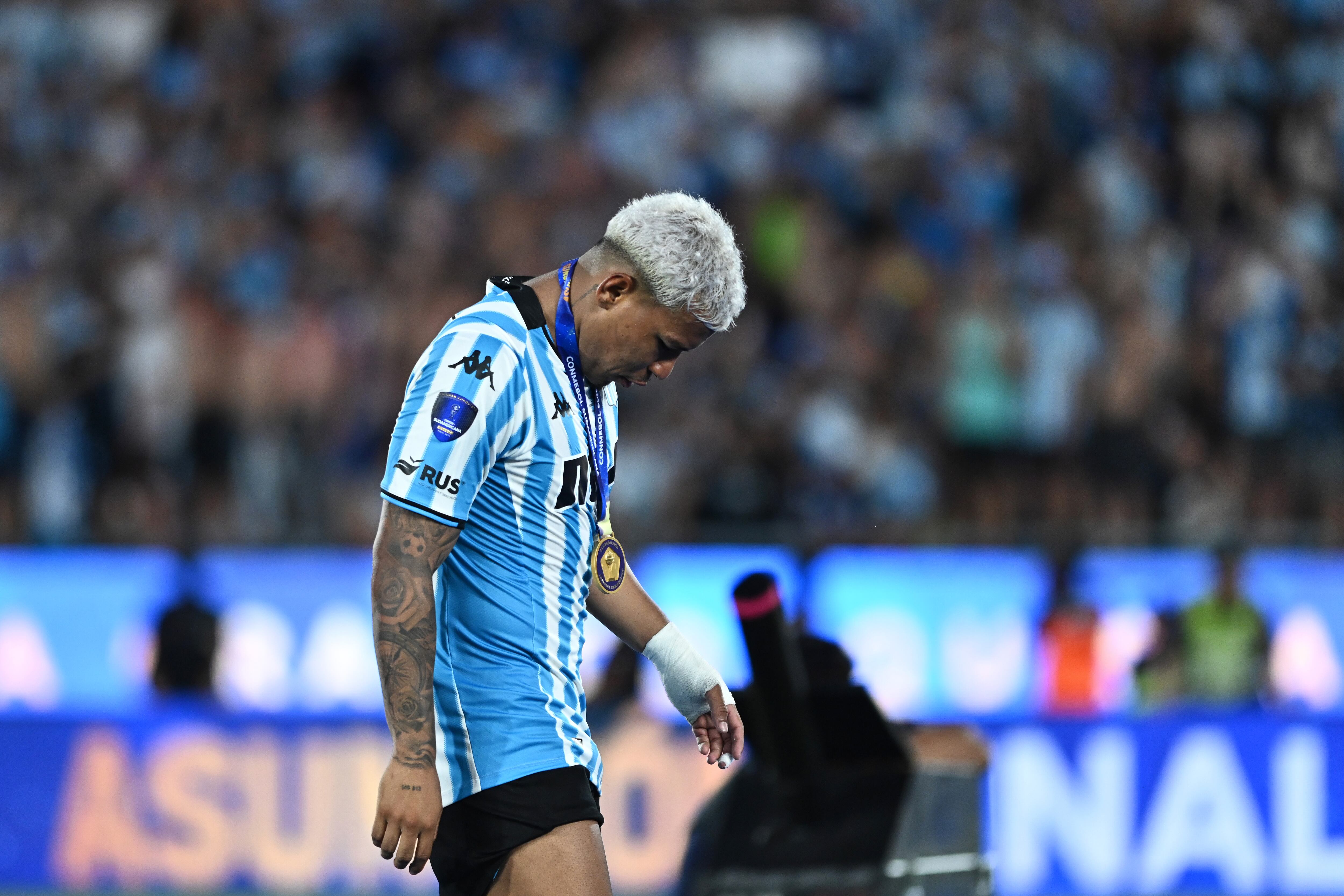 ASUNCION, PARAGUAY - NOVEMBER 23: Roger Martínez of Racing Club reacts after receiving the winner's medal the Copa CONMEBOL Sudamericana 2024 Final between Racing Club and Cruzeiro at Estadio General Pablo Rojas - La Nueva Olla on November 23, 2024 in Asuncion, Paraguay.  (Photo by Rodrigo Valle/Getty Images)