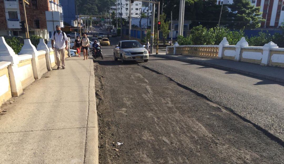 Reparación asfáltica del puente Jiménez de Manga