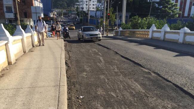 Reparación asfáltica del puente Jiménez de Manga