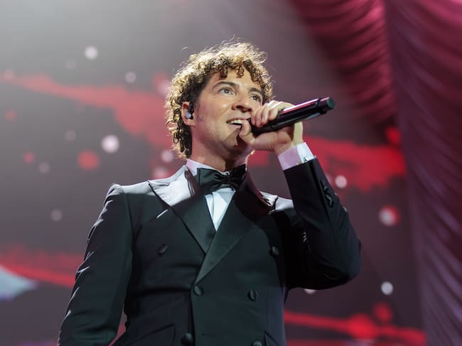 BARCELONA, SPAIN - DECEMBER 23: David Bisbal performs in concert during his tour “Todo es posible en Navidad” (Everything Is Possible at Christmas) at Palau Sant Jordi on December 23, 2025 in Barcelona, Spain. (Photo by Gisela Jané/WireImage)
