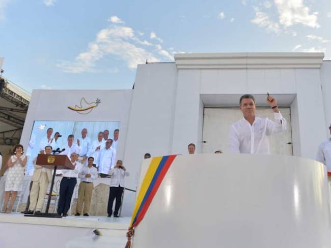 EL presidente Juan Manuel Santos durante el acto de firma de los acuerdos de paz, celebrando en Cartagena.