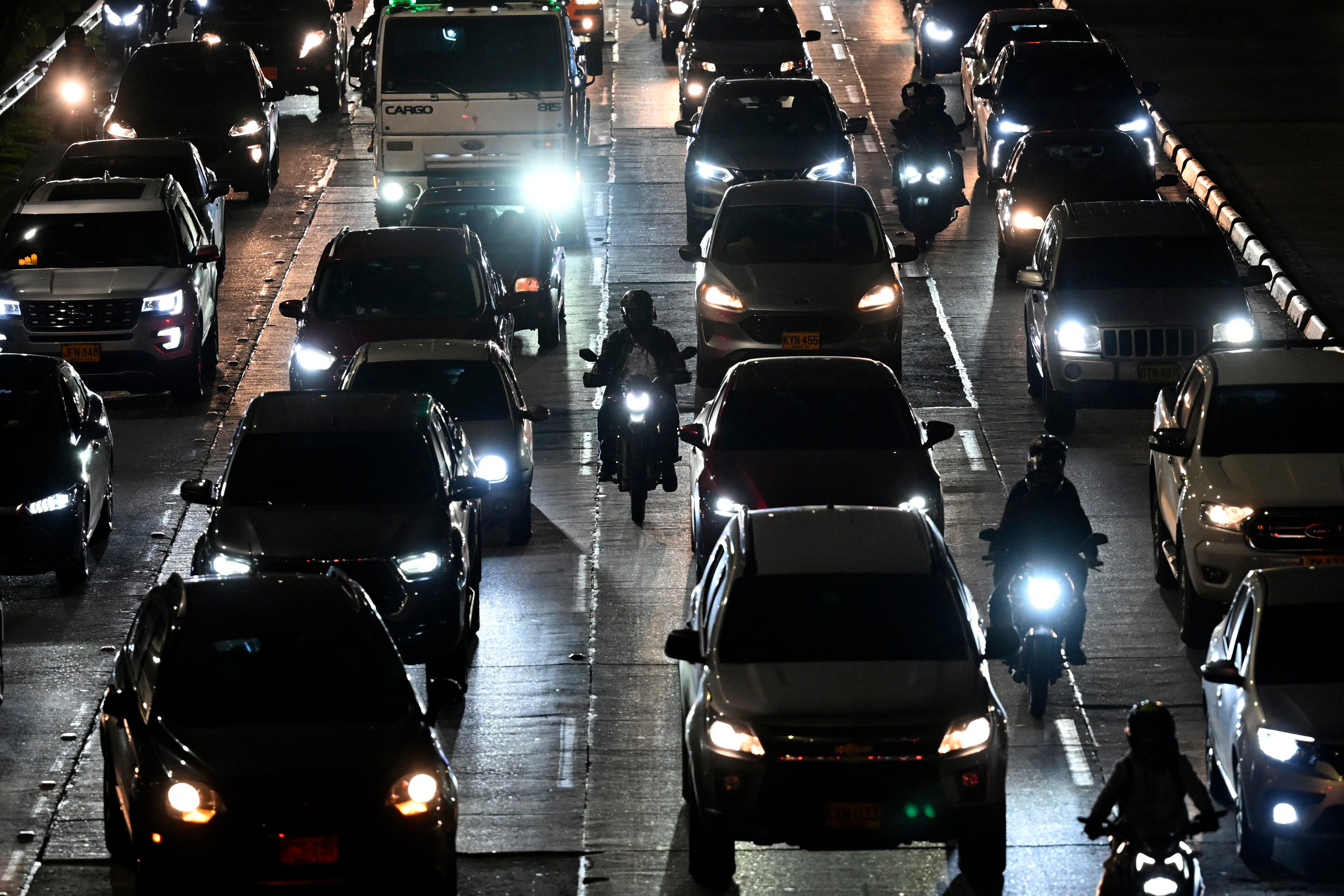 Vehicles are seen during a traffic jam in Bogota on December 20, 2024. (Photo by Pablo VERA / AFP) (Photo by PABLO VERA/AFP via Getty Images)