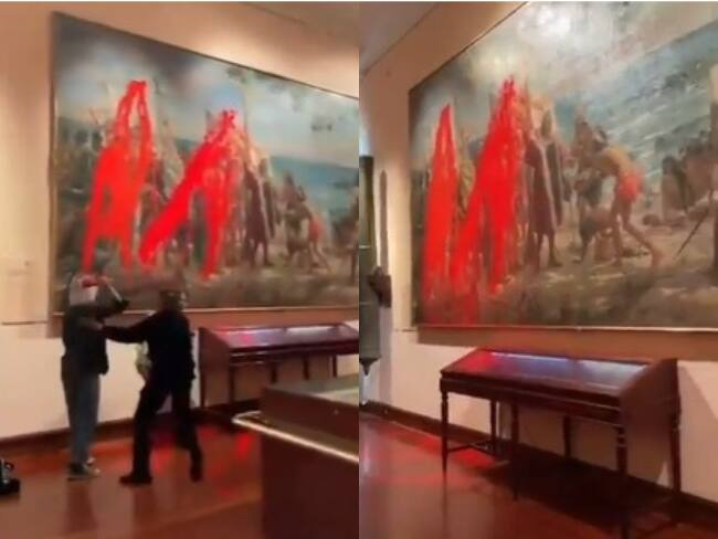 Activistas dañan pintura de Cristobal Colón como protesta por la Fiesta Nacional de España