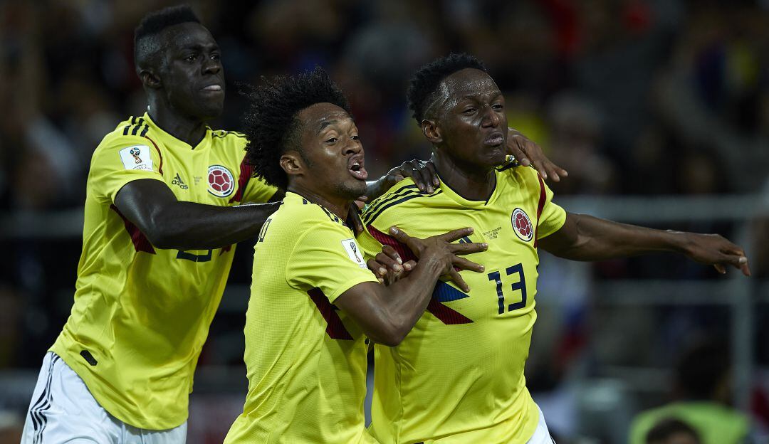 Dávinson Sánchez, Juan Guillermo Cuadrado y Yerry Mina festejan un gol en el Mundial de Rusia 2018.