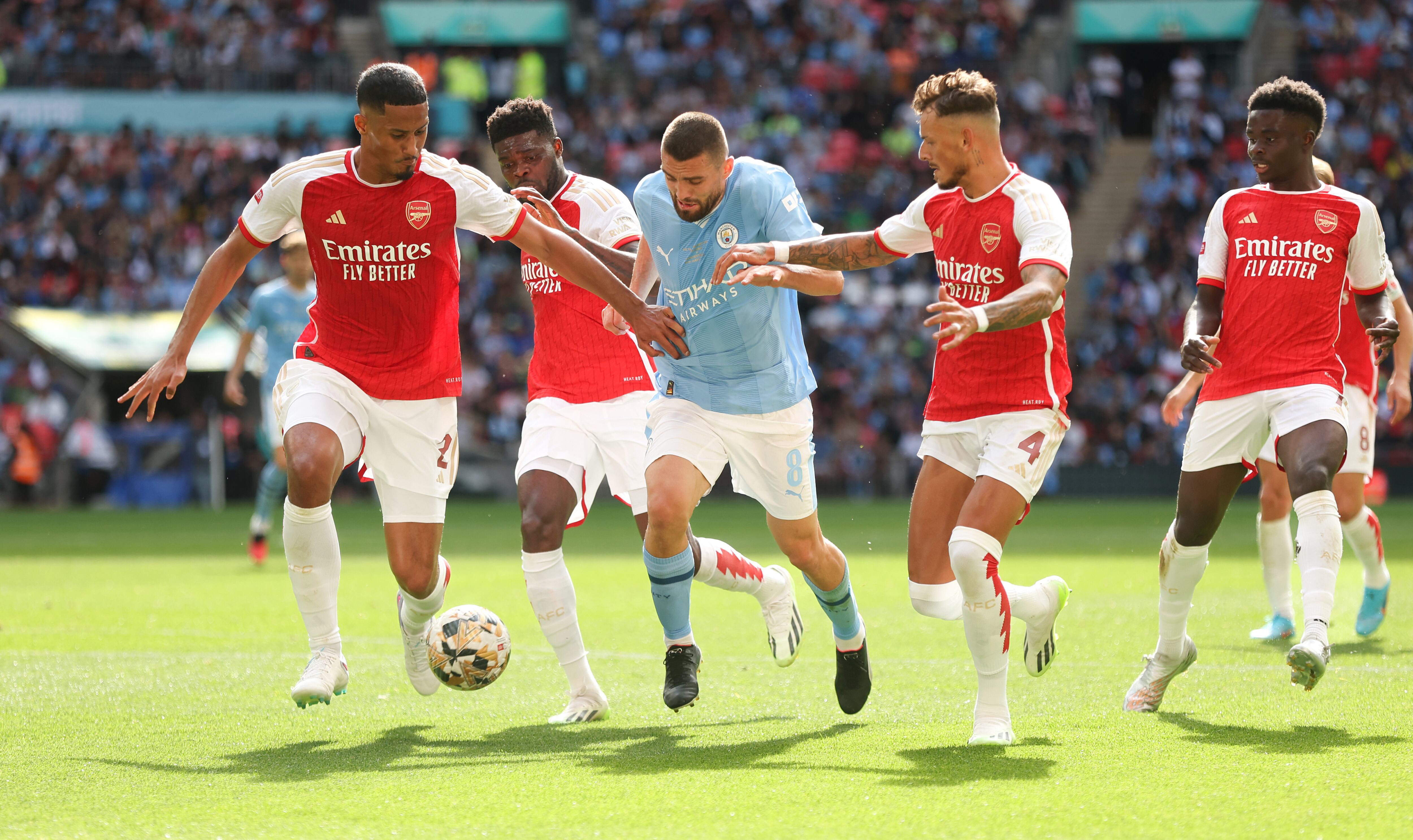 Duelo entre Manchester City y Arsenal. (Photo by Rob Newell - CameraSport via Getty Images)