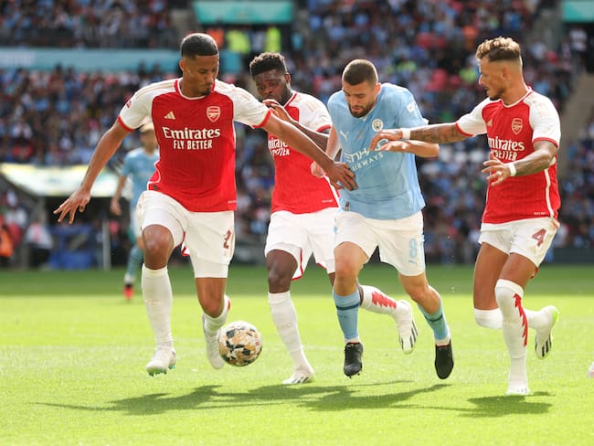 Duelo entre Manchester City y Arsenal. (Photo by Rob Newell - CameraSport via Getty Images)