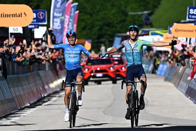 SAN VALENTINO (Italy), 27/05/2025.- Italian rider Lorenzo Fortunato of XDS Astana Team wearing the best climber's blue jersey and Italian rider Christian Scaroni of XDS Astana Team celebrate after crossing the finish line and win the 16th stage of the 108 Giro d'Italia 2025, cycling race over 203 km from Piazzola sul Brenta to San Valentino, Italy, 27 May 2025. (Ciclismo, Italia) EFE/EPA/LUCA ZENNARO
