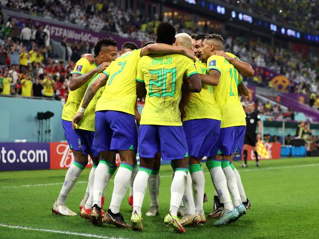 DOHA, QATAR - DECEMBER 05: Lucas Paqueta of Brazil celebrates with teammates after scoring the team&#039;s fourth goal during the FIFA World Cup Qatar 2022 Round of 16 match between Brazil and South Korea at Stadium 974 on December 05, 2022 in Doha, Qatar. (Photo by Francois Nel/Getty Images)