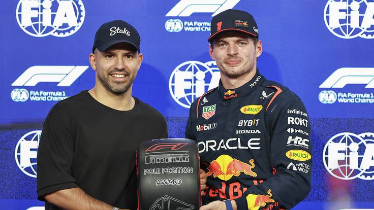 ABU DHABI, UNITED ARAB EMIRATES - NOVEMBER 25: Sergio Aguero of Argentina presents Max Verstappen of the Netherlands and Oracle Red Bull Racing with the pole position award in parc feme during qualifying ahead of the F1 Grand Prix of Abu Dhabi at Yas Marina Circuit on November 25, 2023 in Abu Dhabi, United Arab Emirates. (Photo by )